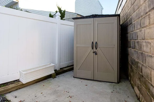 a view of a room with rack on the wall