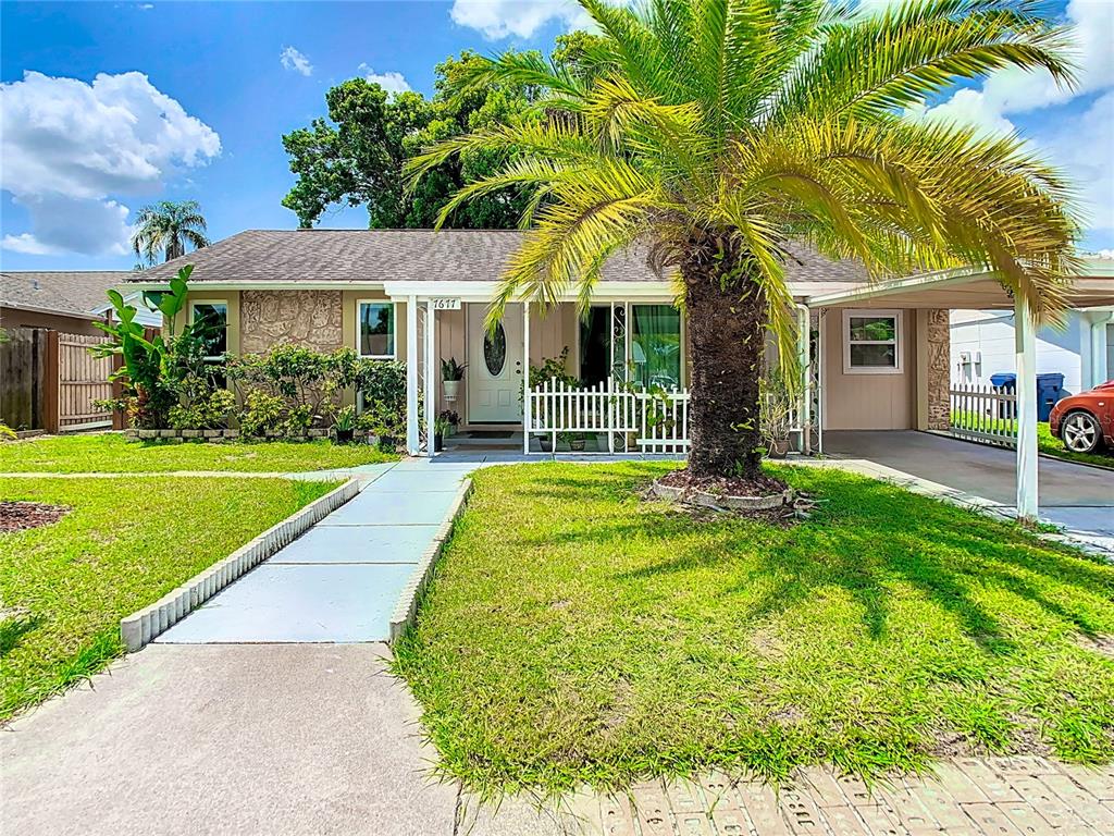 7677 Montague Loop New Port Richey, FL 34655 - Photo 1 of 1 a view of a house with a swimming pool