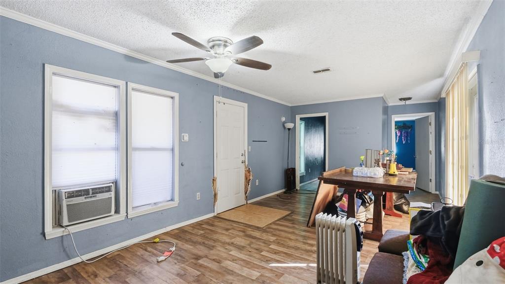 10565 Bessemer Street New Port Richey, FL 34654 - Photo 57 of 72 a bedroom with a bed and a window
