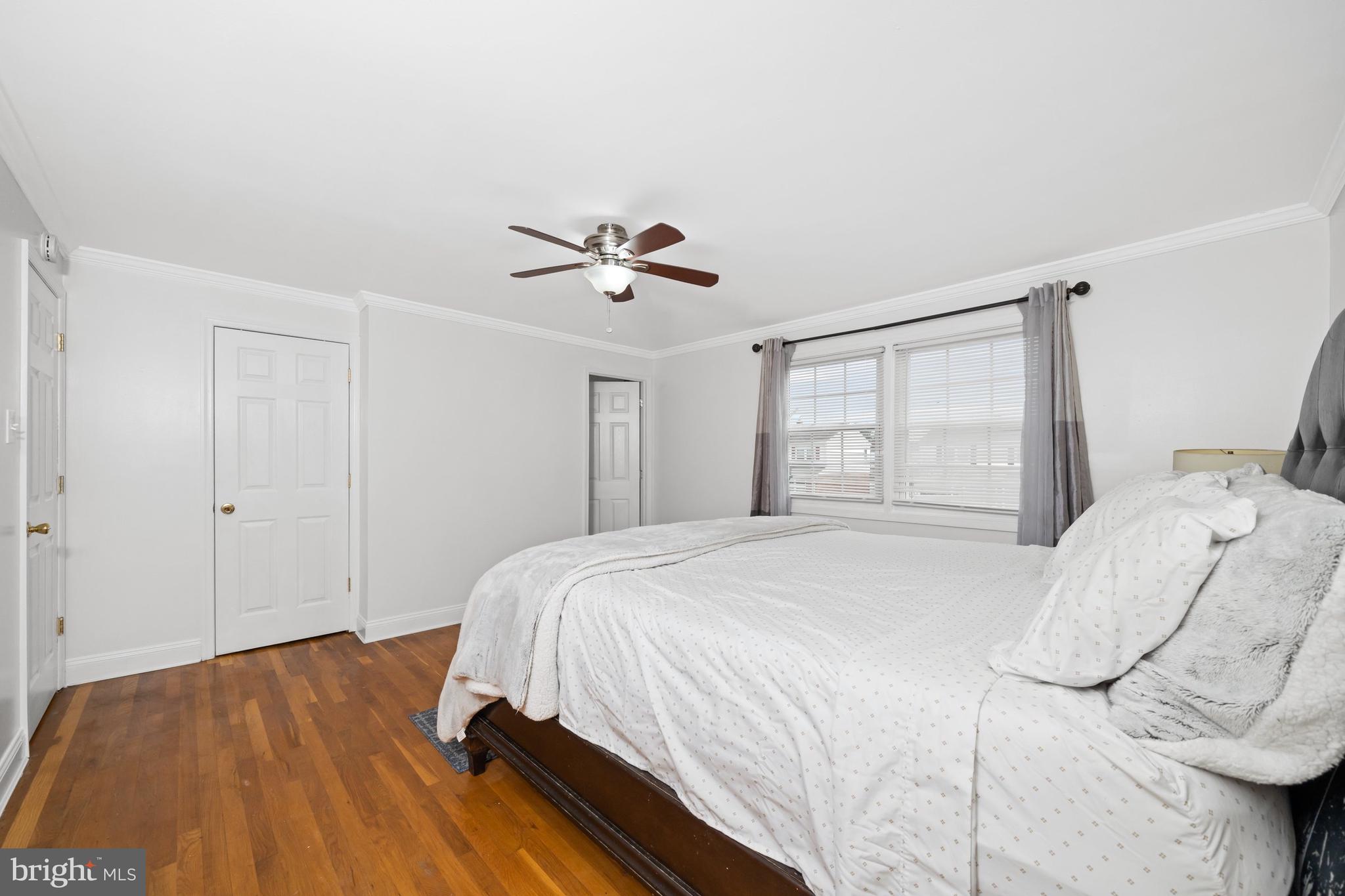18 George Read Road New Castle, DE 19720 - Photo 29 of 40 a bedroom with a bed and a chandelier