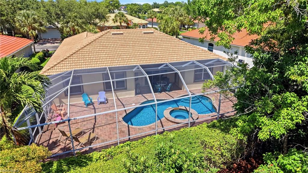 3951 Ruxton Road Naples, FL 34116 - Photo 32 of 35 a view of a backyard with plants