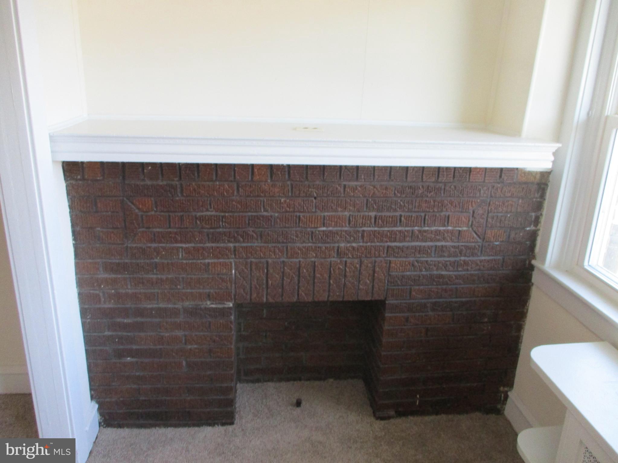 2952 Robbins Street Philadelphia, PA 19149 - Photo 19 of 19 Fireplace in living room