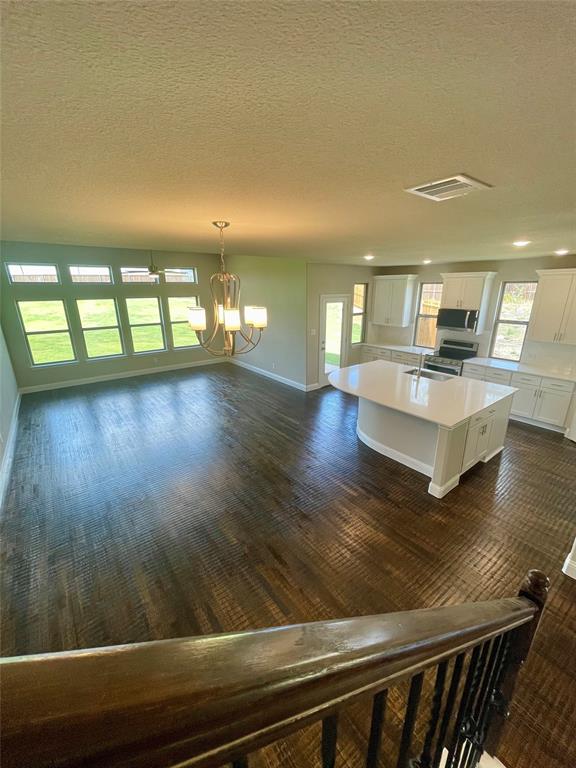 5004 Picasso Road Royse City, TX 75189 - Photo 6 of 20 a view of a living room and dining room