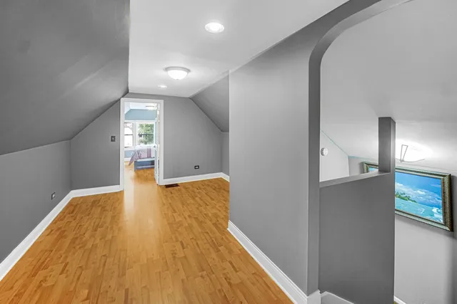 a view of livingroom with hardwood floor and a ceiling fan