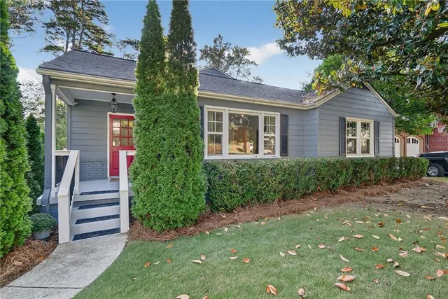 front view of a house with a yard