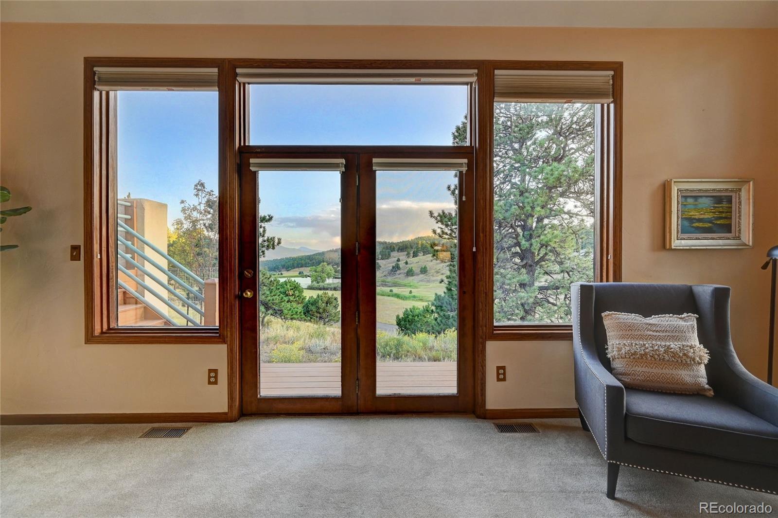 734 Spring Ranch Drive Golden, CO 80401 - Photo 20 of 40 a view of room with window and furniture