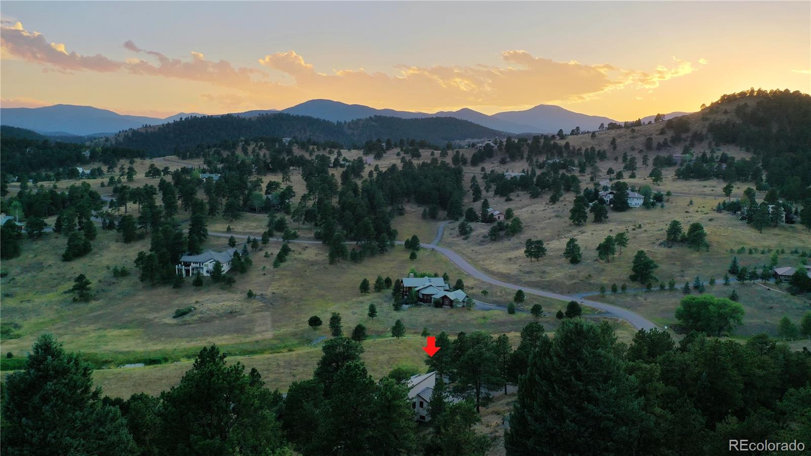 734 Spring Ranch Drive Golden, CO 80401 - Photo 38 of 40 a view of a house with a street