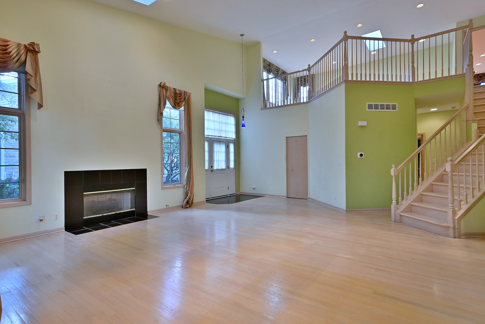 1735 Park Ridge Point Park Ridge, IL 60068 - Photo 10 of 64 a view of a kitchen with a fireplace and a living room