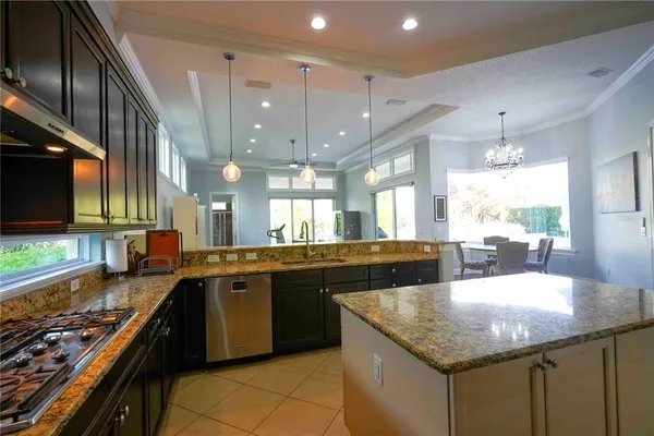 a kitchen with granite countertop lots of counter top space