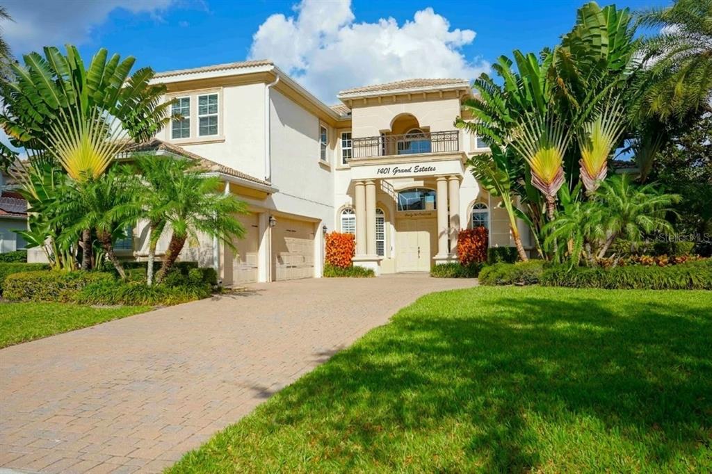 6219 Tiroco Way Windermere, FL 34786 - Photo 2 of 41 a view of a building with a yard