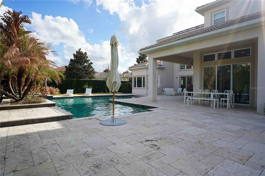 6219 Tiroco Way Windermere, FL 34786 - Photo 32 of 41 a view of a house with backyard and sitting area