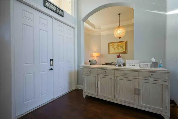 a bathroom with a granite countertop sink mirror and