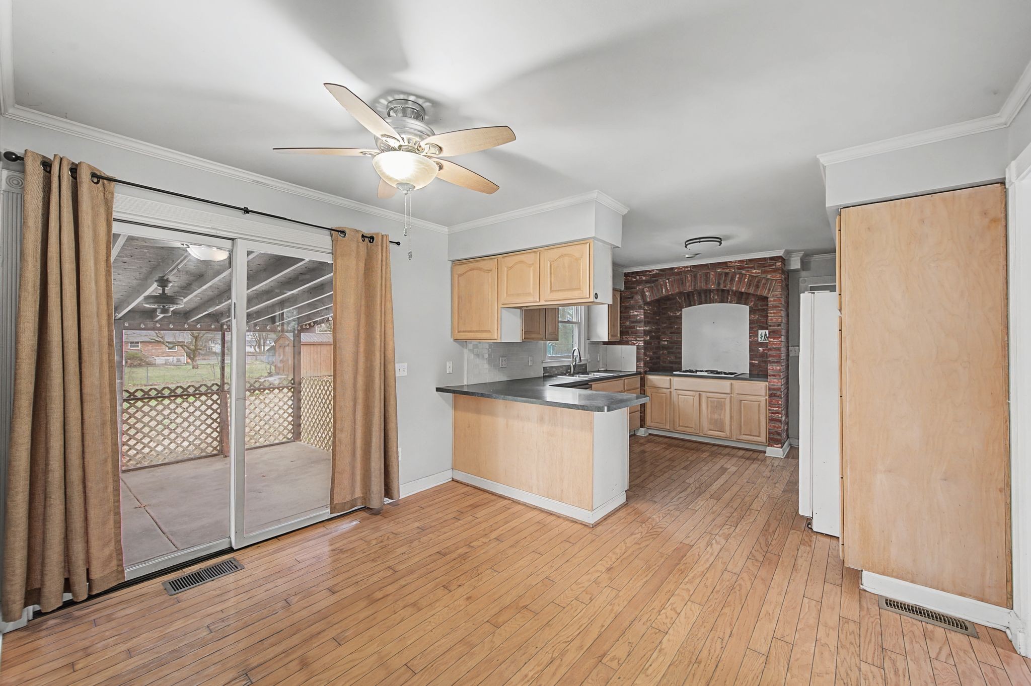 551 Bellevue Road North Nashville, TN 37221 - Photo 11 of 45 a kitchen with white cabinets and white appliances