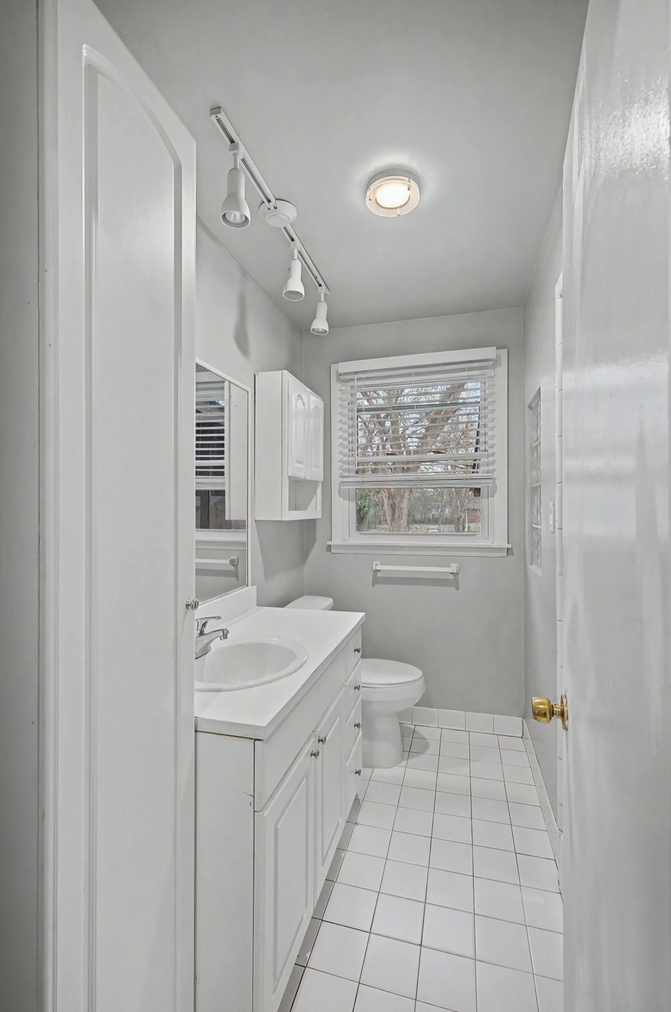 551 Bellevue Road North Nashville, TN 37221 - Photo 21 of 45 a bathroom with a granite countertop sink a toilet a large mirror and shower