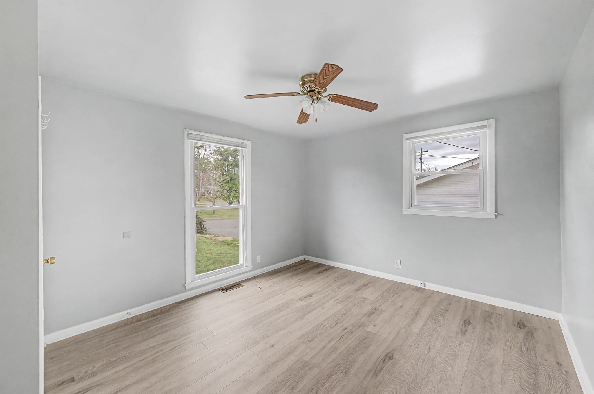 551 Bellevue Road North Nashville, TN 37221 - Photo 26 of 45 a view of empty room with wooden floor and fan