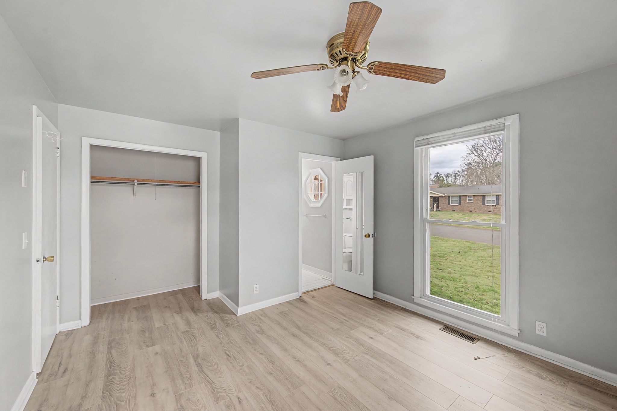551 Bellevue Road North Nashville, TN 37221 - Photo 27 of 45 wooden floor in an empty room with a window