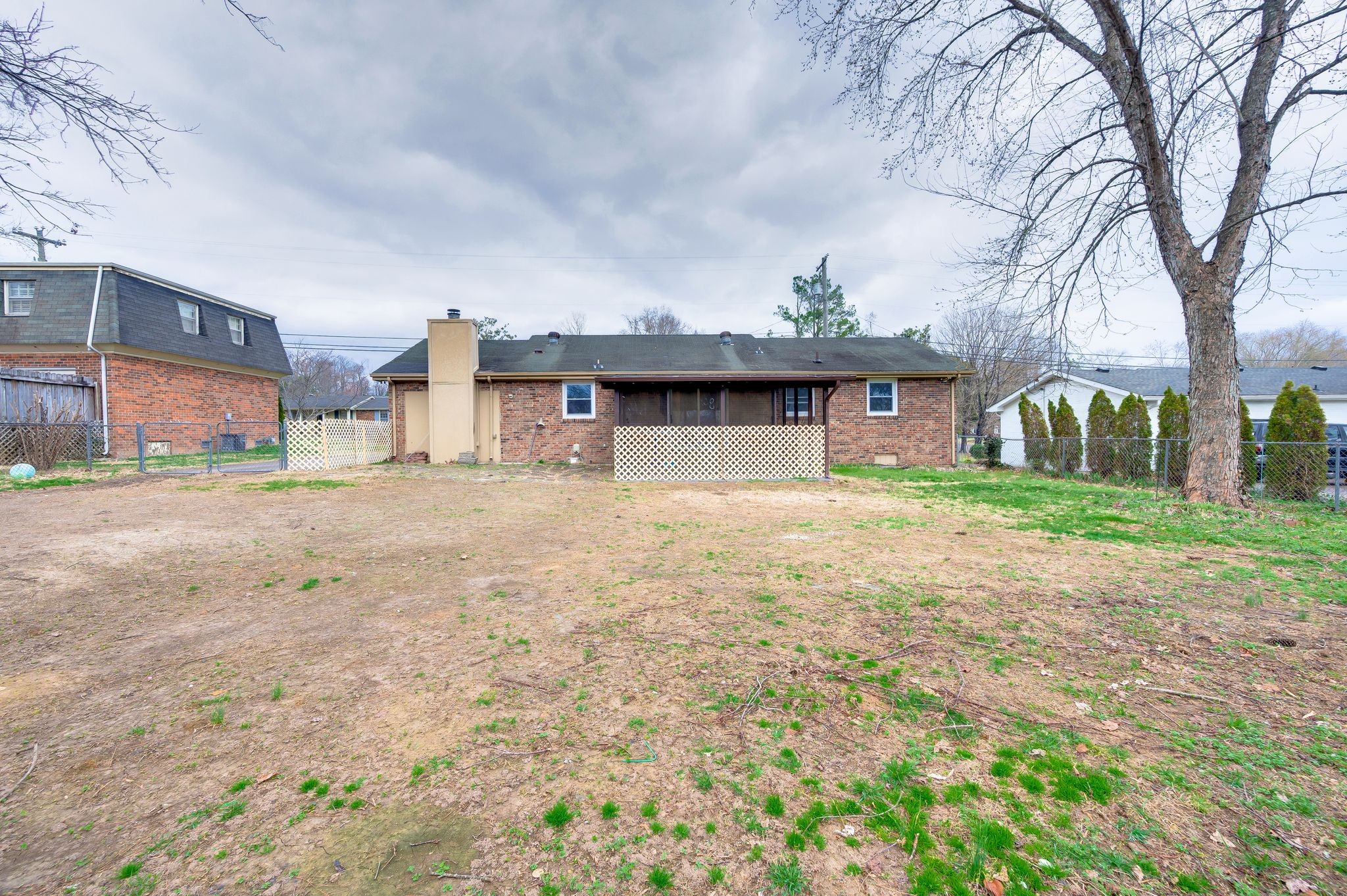 551 Bellevue Road North Nashville, TN 37221 - Photo 34 of 45 a front view of a house with a yard and garage