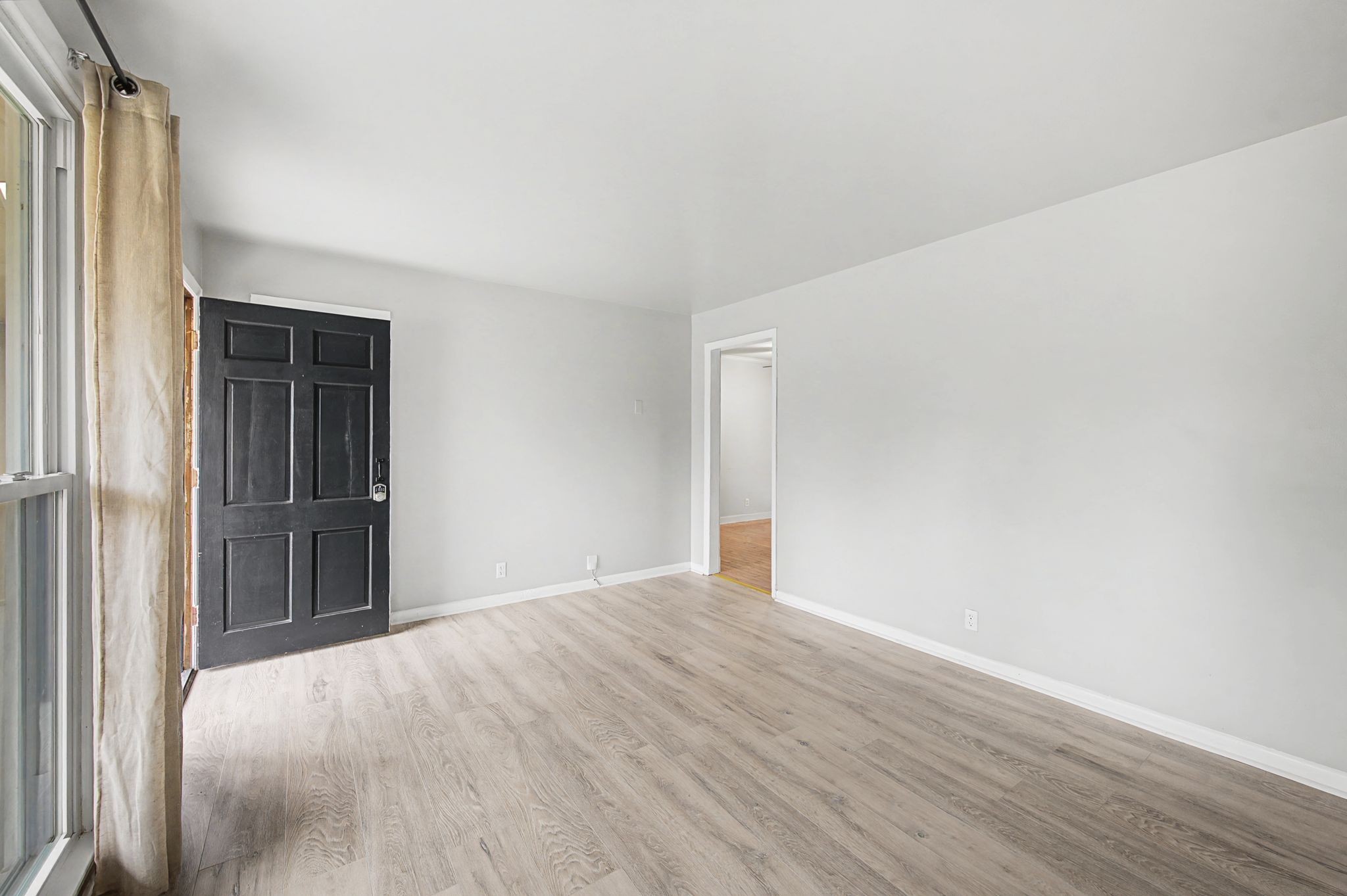551 Bellevue Road North Nashville, TN 37221 - Photo 7 of 45 a view of an empty room and wooden floor