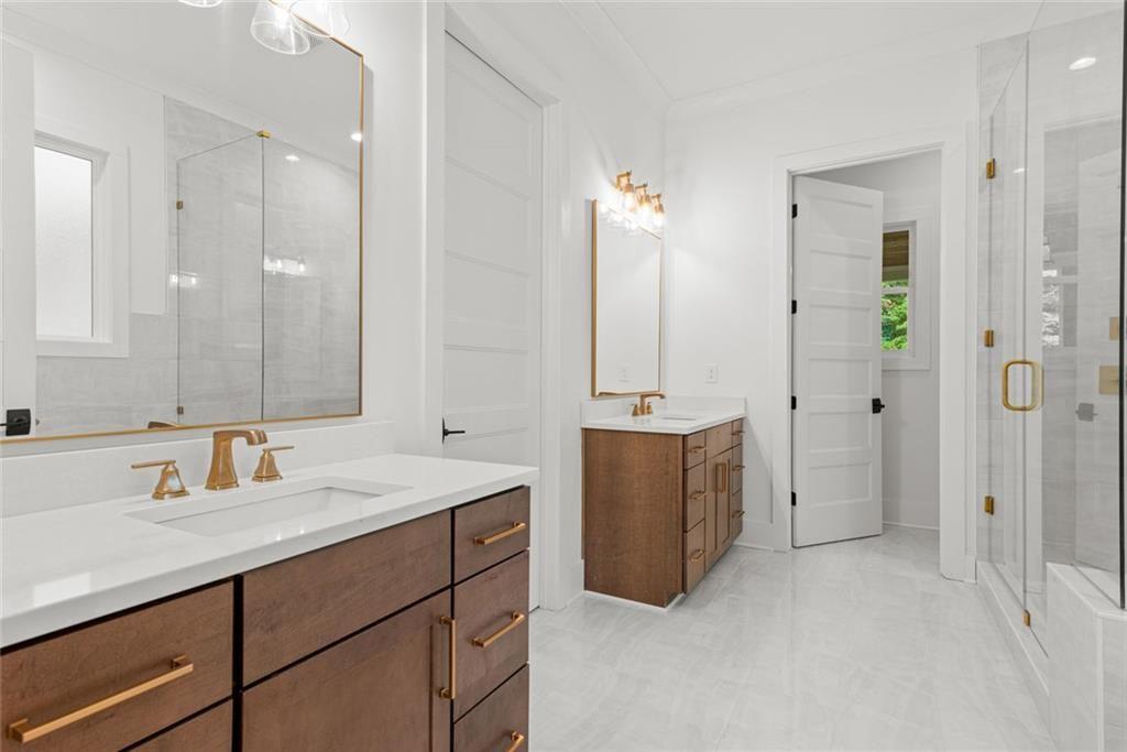 240 Highlands Ball Ground, GA 30107 - Photo 29 of 57 a bathroom with a sink and a mirror
