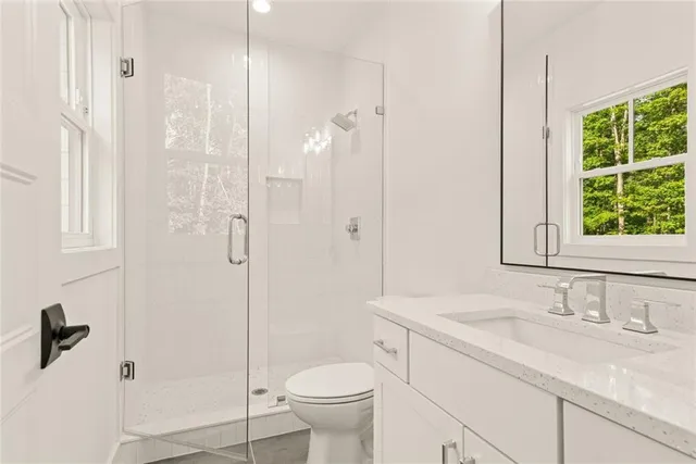 a view of a room with a wooden door