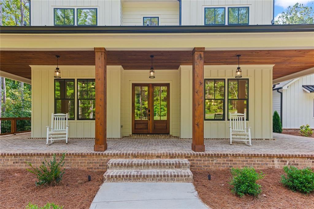240 Highlands Ball Ground, GA 30107 - Photo 6 of 57 a view of a entrance door of the house