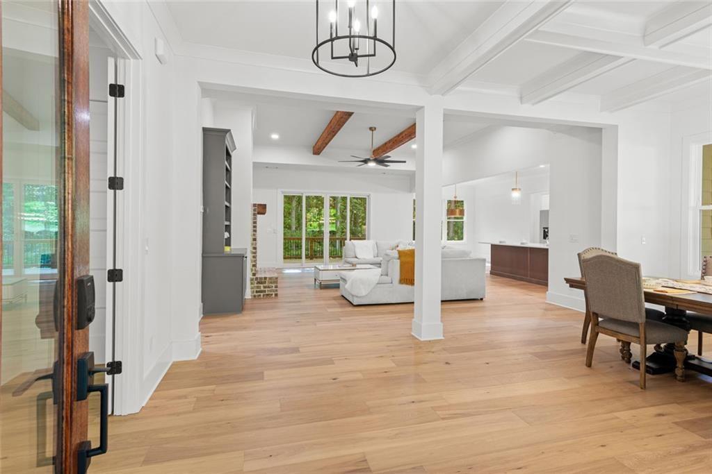 240 Highlands Ball Ground, GA 30107 - Photo 9 of 57 a living room with furniture and a table