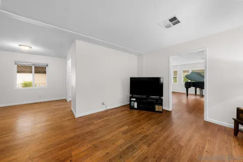 a view of livingroom with furniture and wooden floor