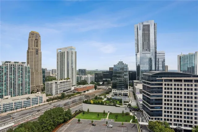 a view of city with tall buildings