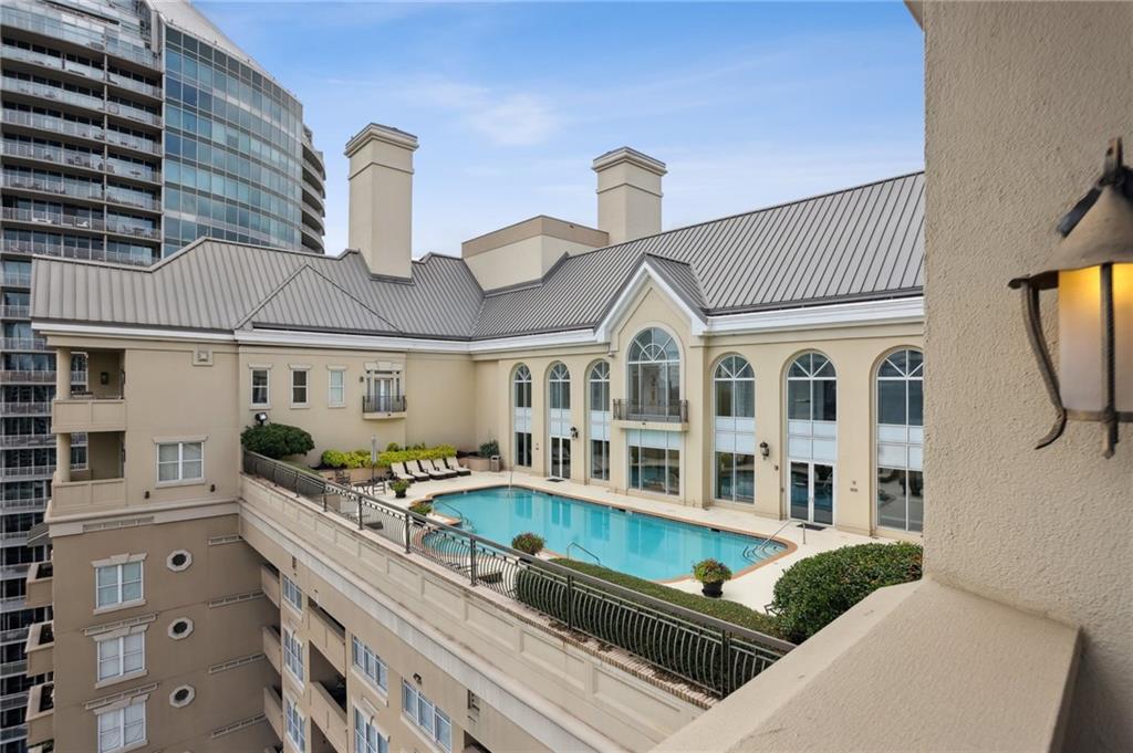 3334 Peachtree Road Northeast, Unit 1908 Atlanta, GA 30326 - Photo 18 of 46 a front view of a house with parking space