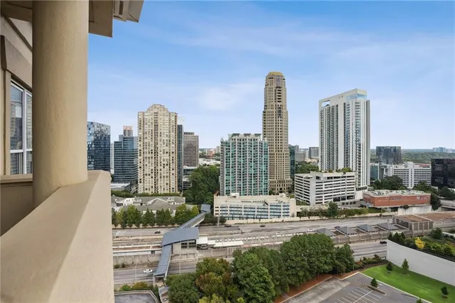 a view of a city with tall buildings