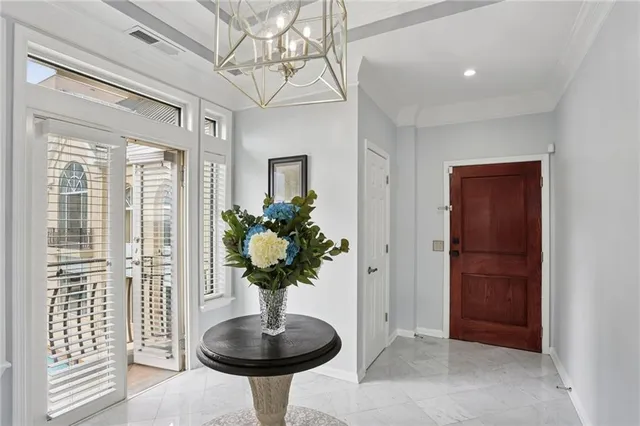 a vase of flowers sitting on a table