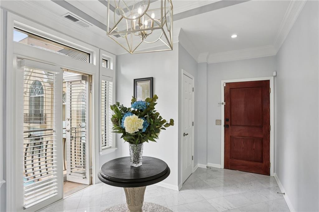 3334 Peachtree Road Northeast, Unit 1908 Atlanta, GA 30326 - Photo 2 of 46 a vase of flowers sitting on a table