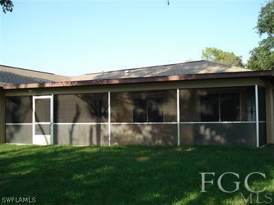 17436 Delaware Road Fort Myers, FL 33967 - Photo 8 of 10 a view of an house with backyard space and garden