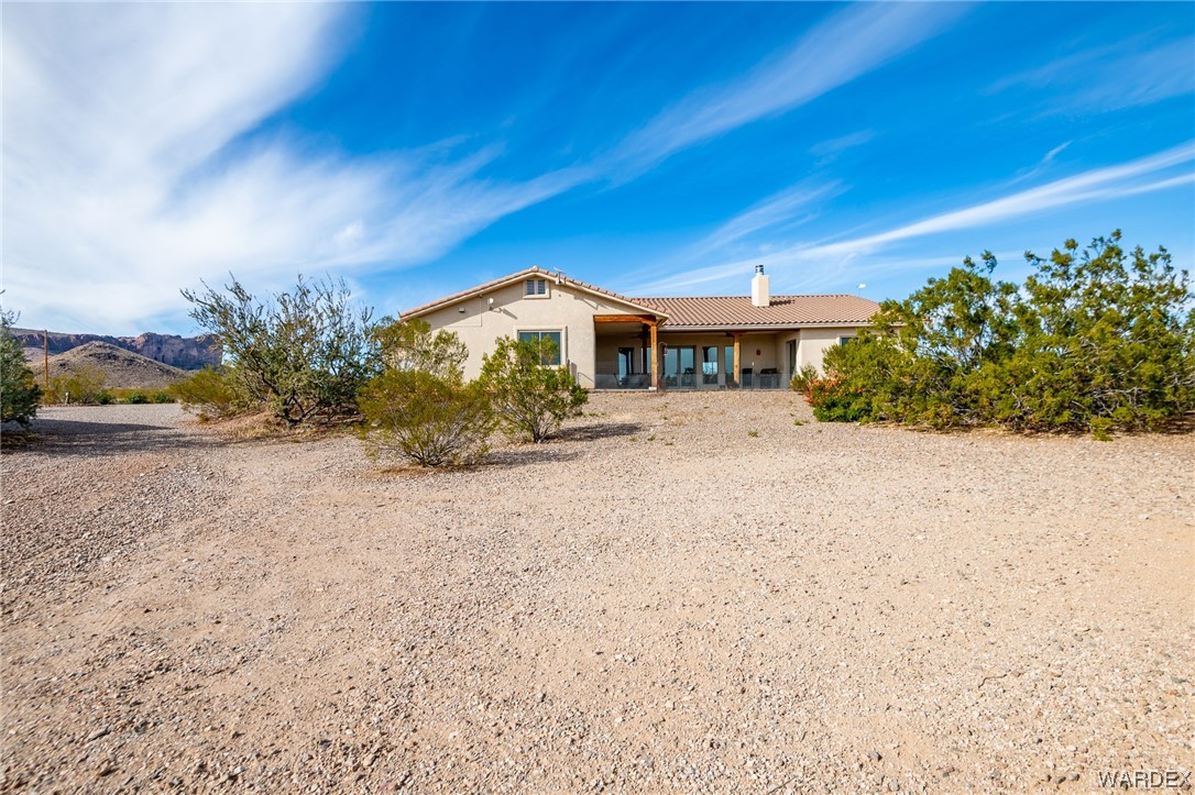 1830 Egar Road Golden Valley, AZ 86413 - Photo 34 of 84 a front view of a house with a yard