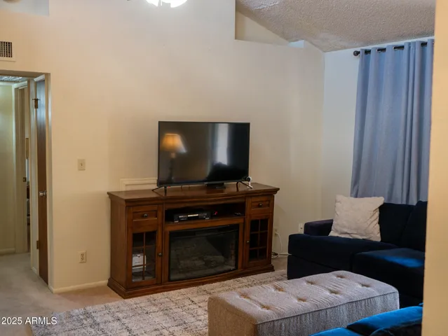 a view of balcony with wooden floor and bench
