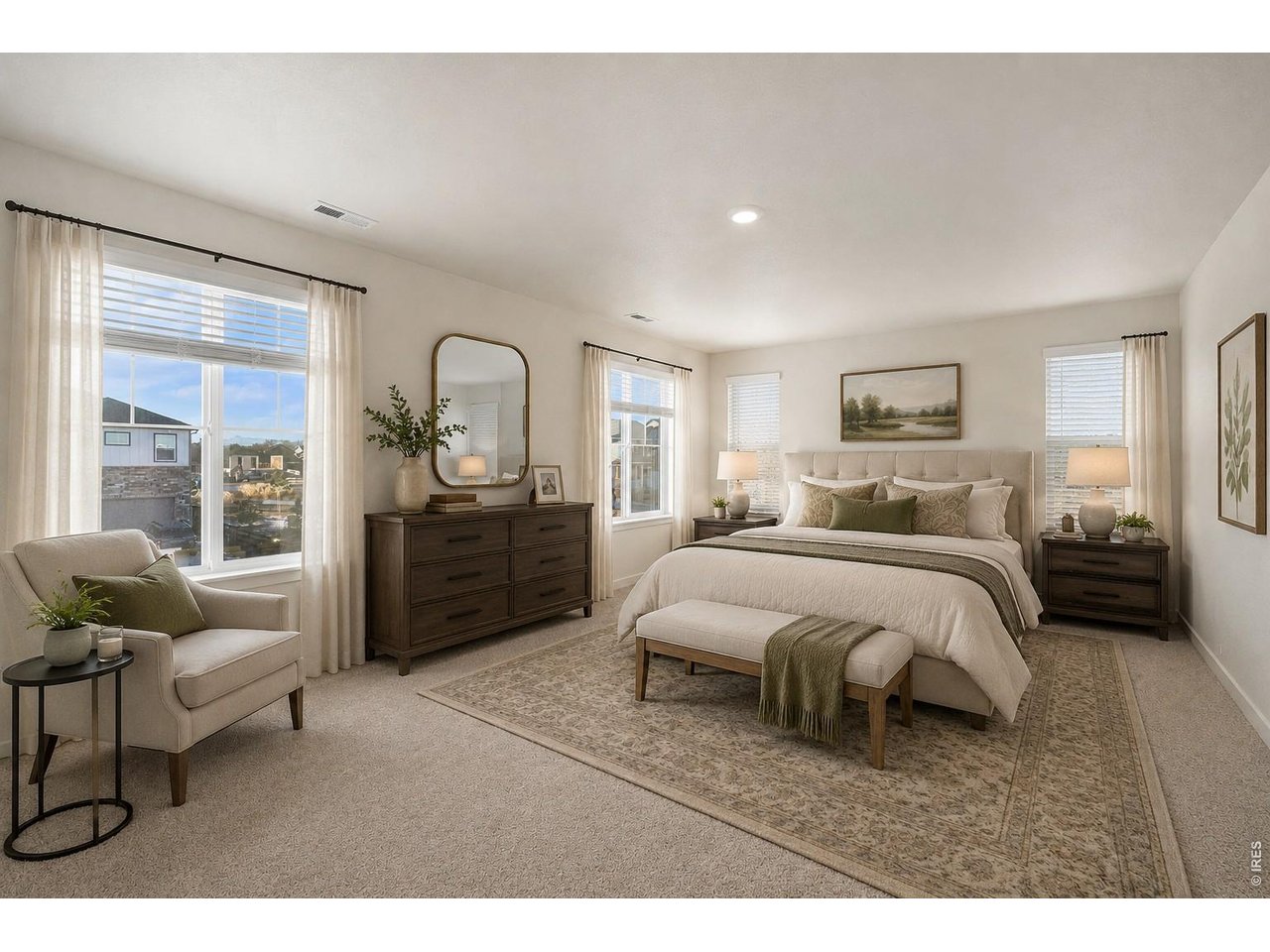 439 Bluebird Road Johnstown, CO 80534 - Photo 17 of 36 a bedroom with a bed a couch and dresser