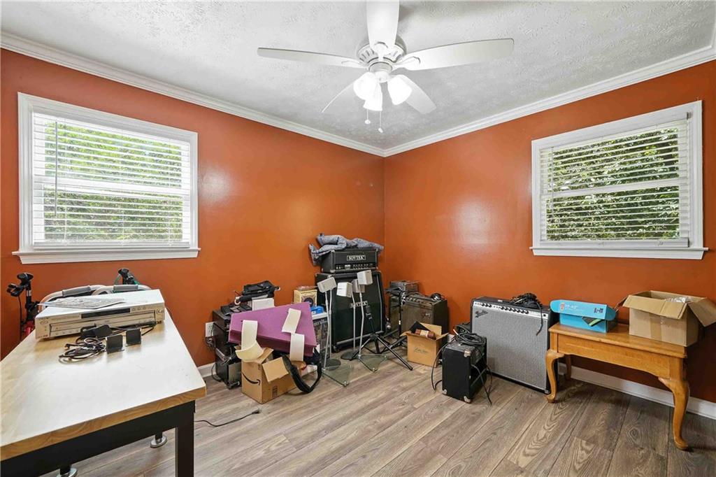 550 Donahoo Road Southeast Silver Creek, GA 30173 - Photo 19 of 29 a room with furniture and a wooden floor