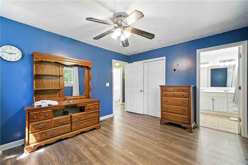 550 Donahoo Road Southeast Silver Creek, GA 30173 - Photo 24 of 29 a view of room with furniture and wooden floor