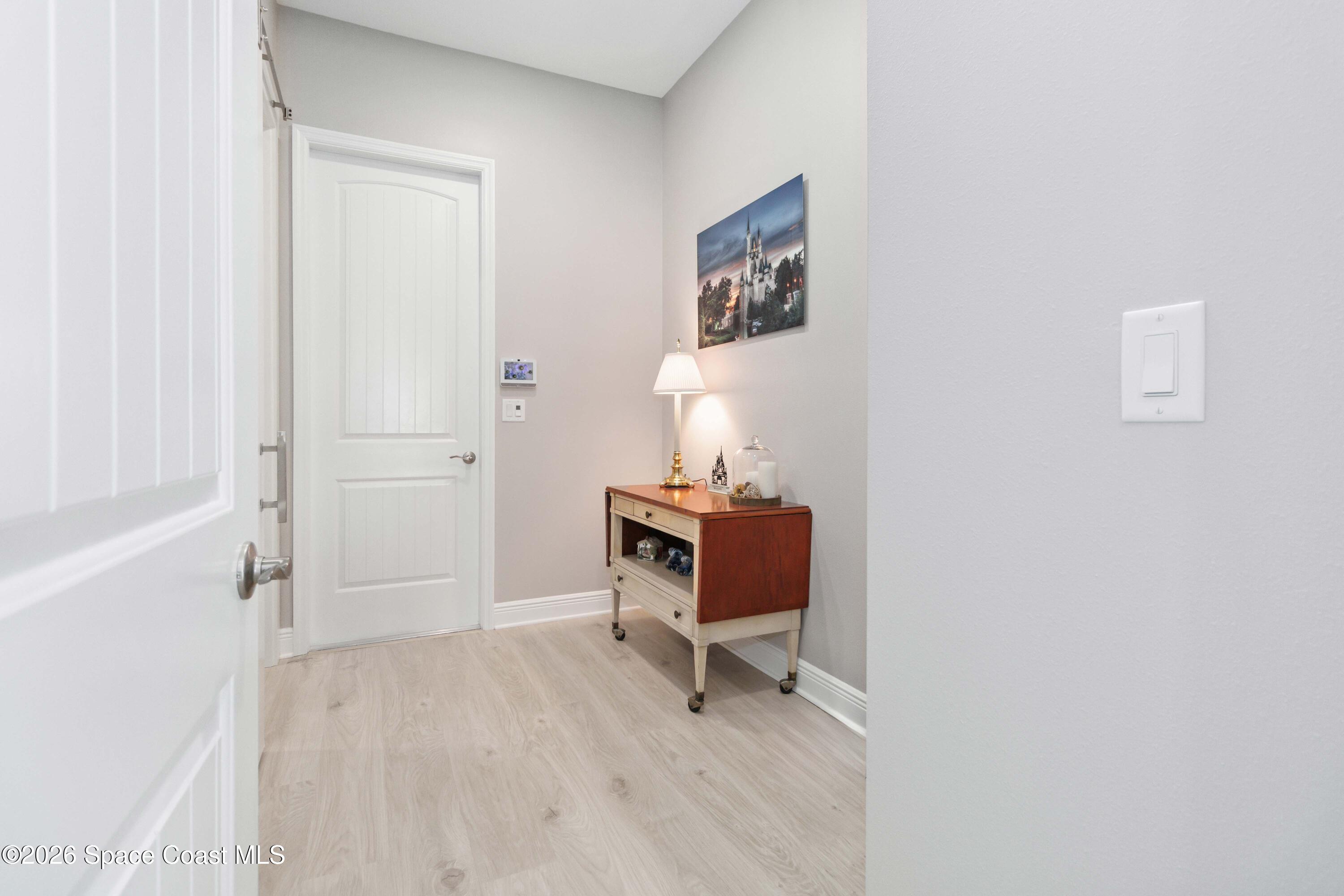 4100 Domain Court Melbourne, FL 32934 - Photo 24 of 52 a workspace room with furniture and wooden floor