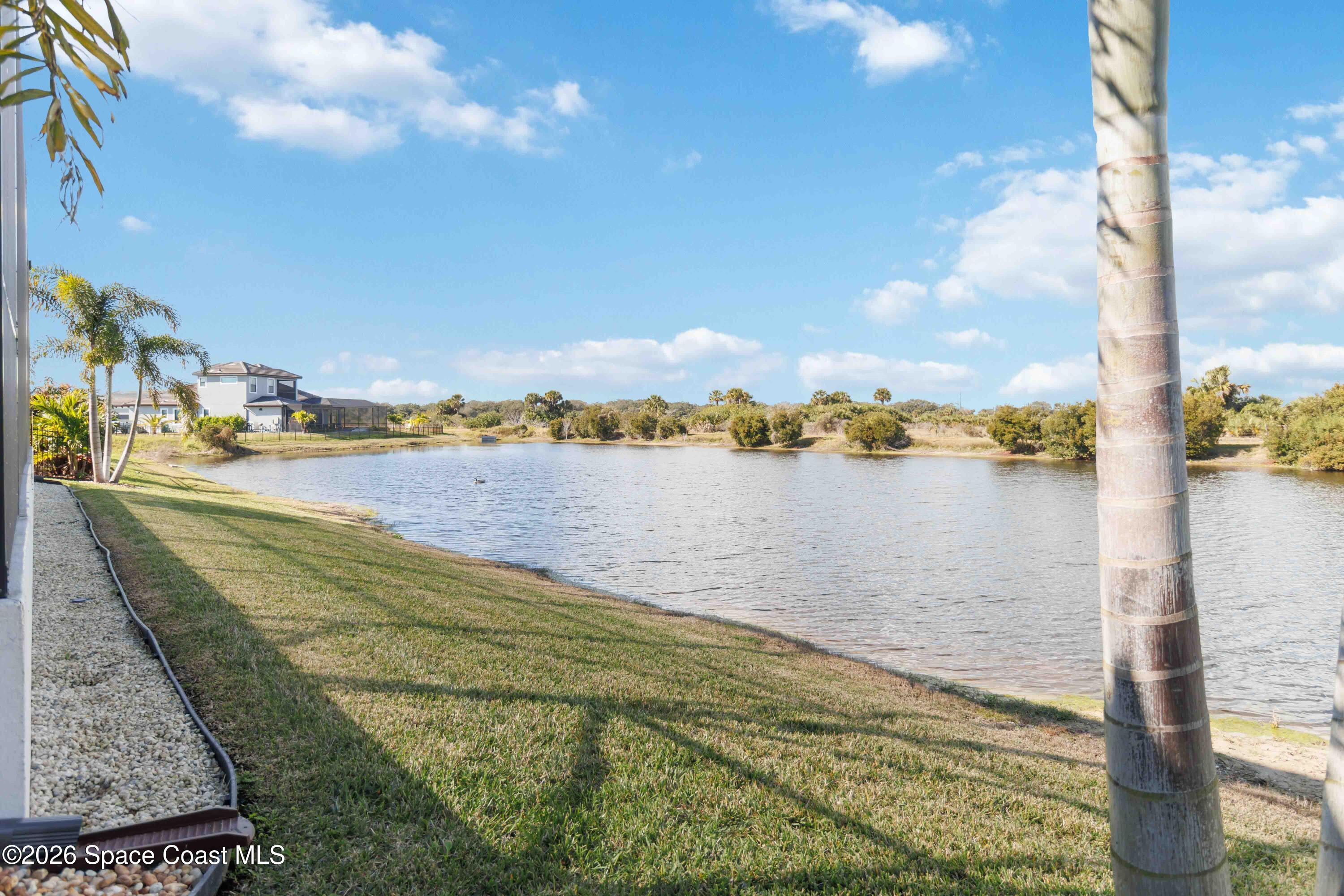 4100 Domain Court Melbourne, FL 32934 - Photo 50 of 52 a view of a lake with houses