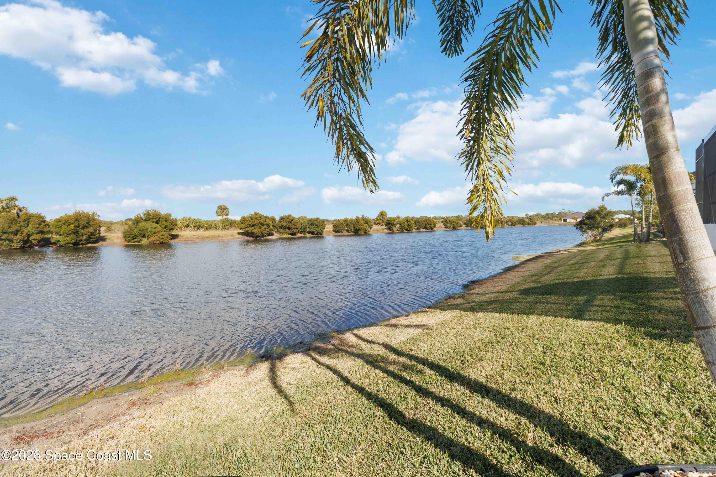 4100 Domain Court Melbourne, FL 32934 - Photo 52 of 52 a view of a lake and mountain in the back