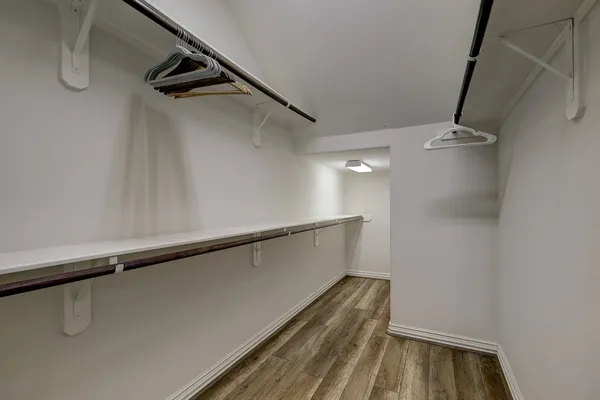 a view of a room with racks on the wall