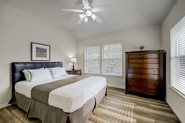 a bedroom with a bed and a closet