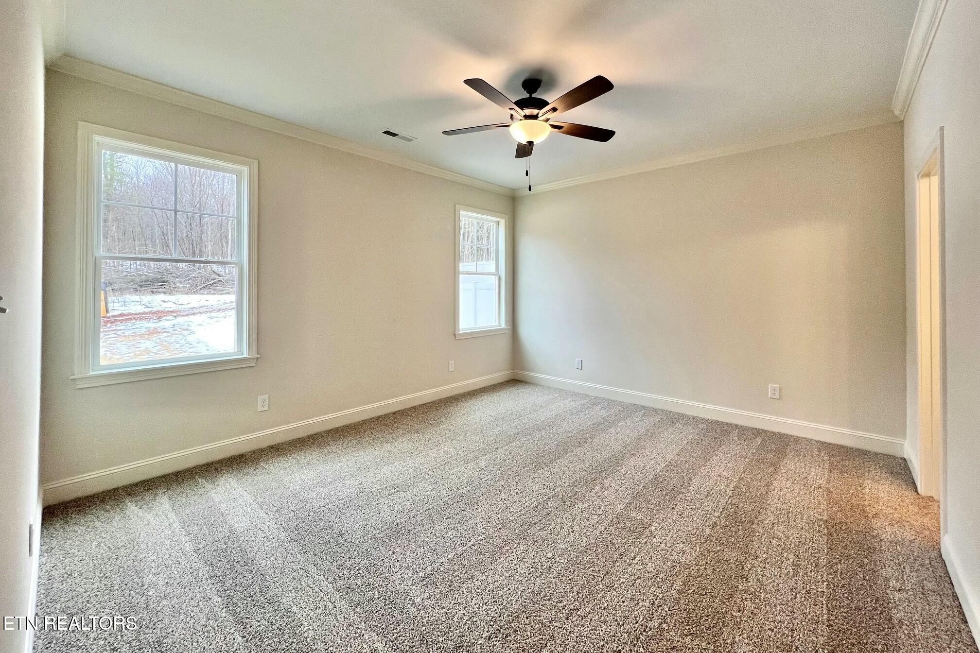 1228 Madison Oaks Road Knoxville, TN 37924 - Photo 13 of 33 a view of an empty room with a window