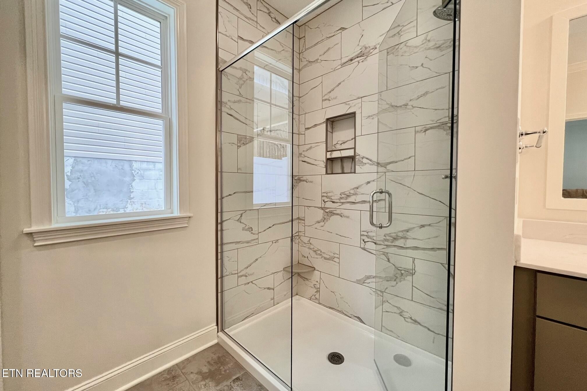 1228 Madison Oaks Road Knoxville, TN 37924 - Photo 16 of 33 a bathroom with a shower