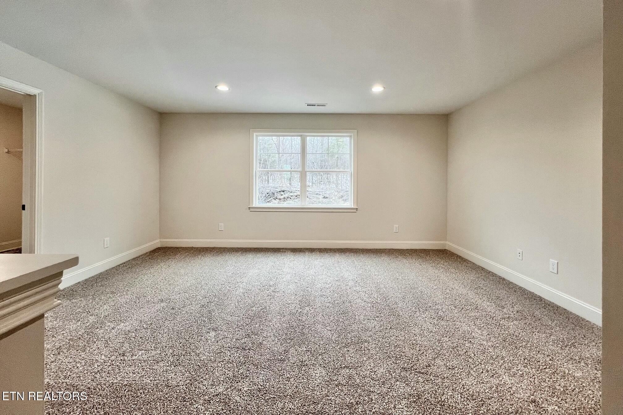 1228 Madison Oaks Road Knoxville, TN 37924 - Photo 19 of 33 an empty room with a window