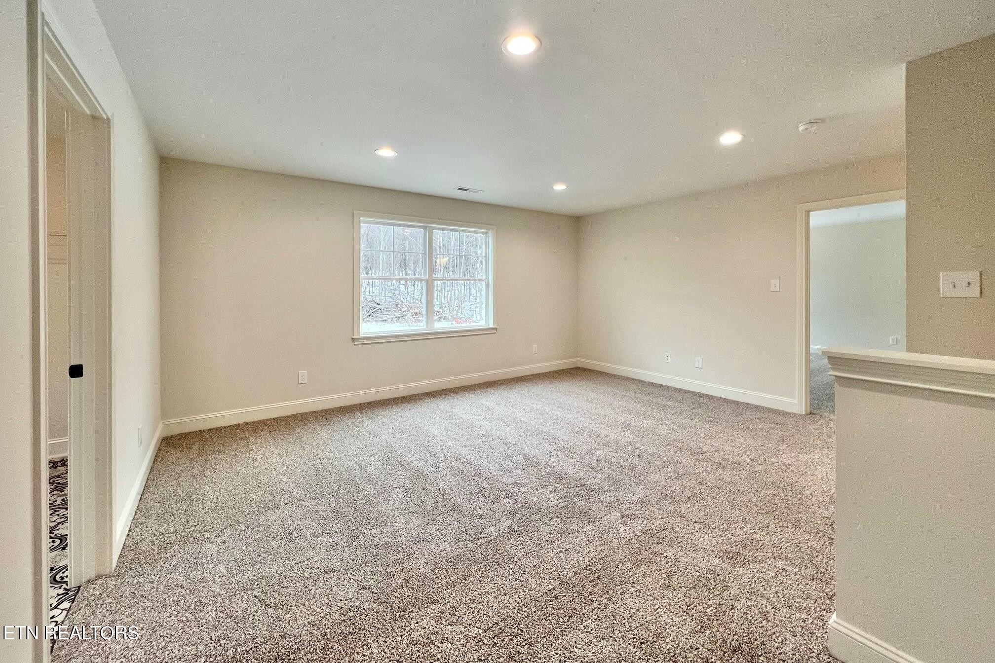 1228 Madison Oaks Road Knoxville, TN 37924 - Photo 20 of 33 an empty room with windows