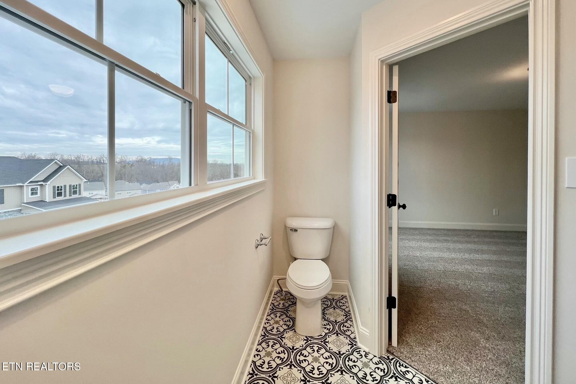 1228 Madison Oaks Road Knoxville, TN 37924 - Photo 24 of 33 a bathroom with a toilet and a shower