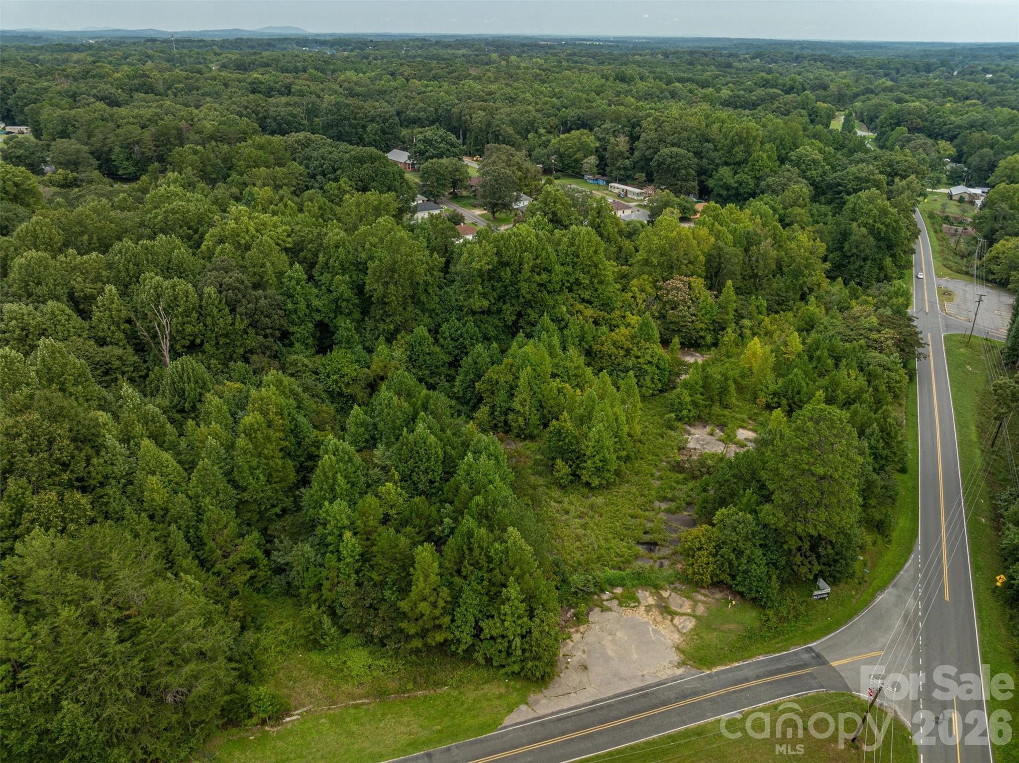 1156 Lyn Well Road Lincolnton, NC 28092 - Photo 14 of 15 an aerial view of residential houses with outdoor space and trees