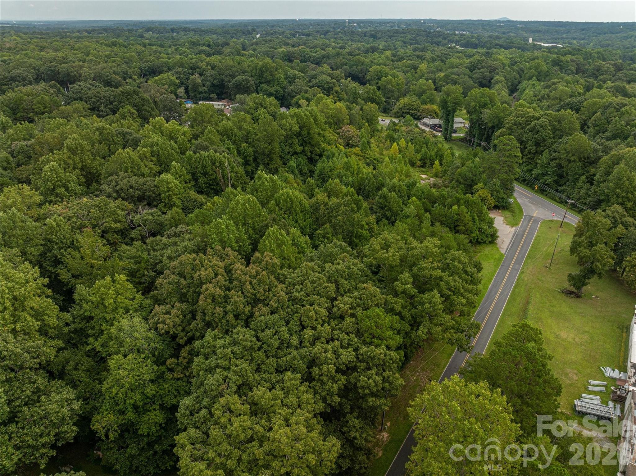 1156 Lyn Well Road Lincolnton, NC 28092 - Photo 15 of 15 an aerial view of residential houses with outdoor space and trees